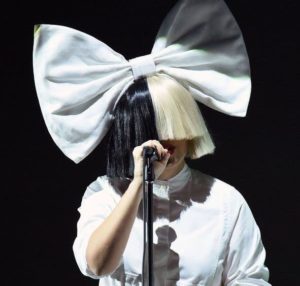 Sia Furler covered face during stage show