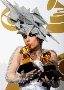Lady Gaga with Grammy Awards