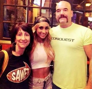 Wrestler Carmella with her parents