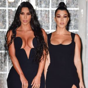 Kourtney Kardashian with her sisters Kim