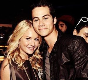 Dylan O’Brien with his girlfriend