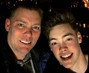 Zach Herron with his father