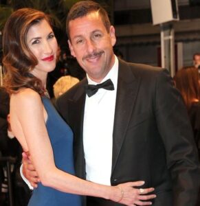 Adam Sandler with his wife