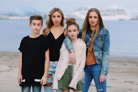 Johnny Orlando with his sisters