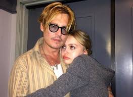 Lily-Rose Depp with her father