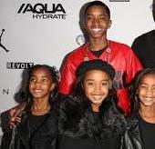 Christian Combs with his sisters
