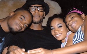 D. L. Hughley with his children