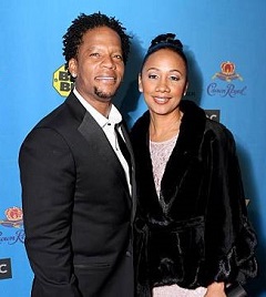 D. L. Hughley with his wife