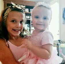 Ava Brown with her sister