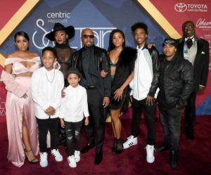 Teddy Riley with his family
