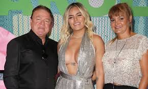 Karol G with her parents