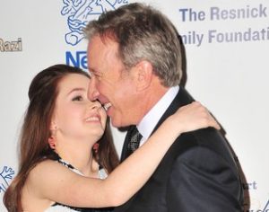Kaitlyn Dever with her father