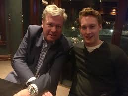 Chris Hansen with his son