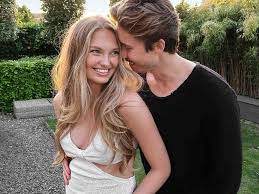 Romee Strijd with her husband