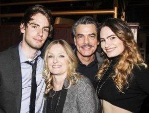 Peter Gallagher with his wife & children
