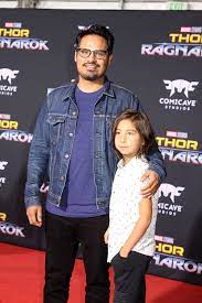 Michael Pena with his son