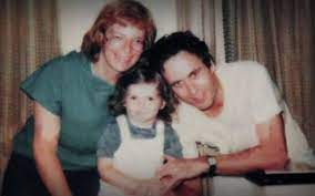 Ted Bundy with his wife & daughter