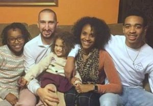 Nick Wright with his wife & children