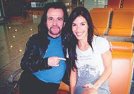 Yanni with his daughter