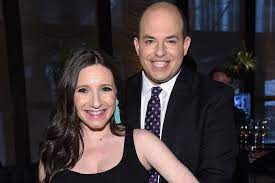 Brian Stelter with his wife Jamie