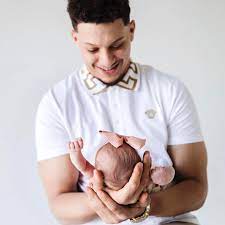 Patrick Mahomes with his daughter