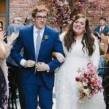 Aidy Bryant with her husband