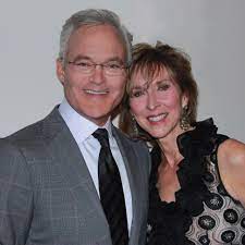 Scott Pelley with his wife
